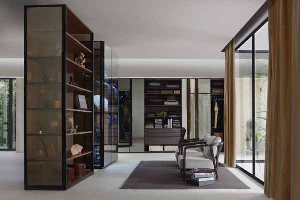 Minimalist wall storage in bright living space