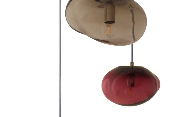 Side view of ELOA pendant lights in vibrant colors, hand-blown from glass