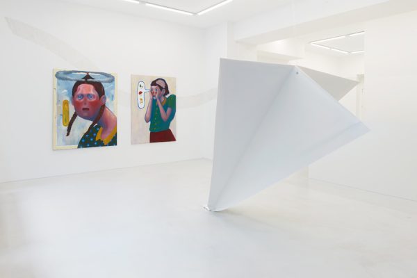 Interior of Galerie Droste with two framed artworks in a minimalist setting