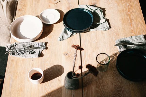 Top view of handcrafted wooden table and accessories – NIROH collection