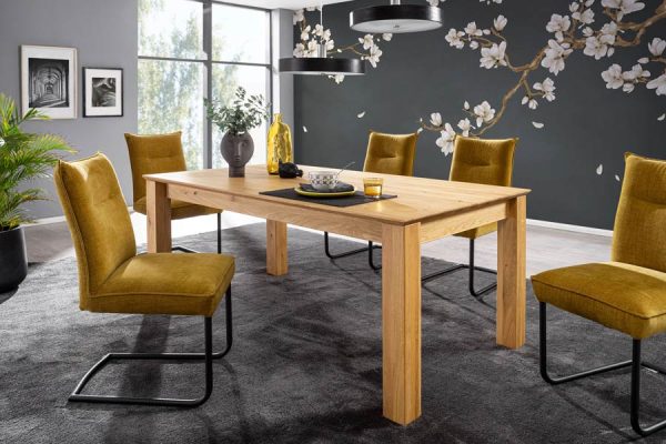 Wooden dining table with bench seating and angled legs – by PLH