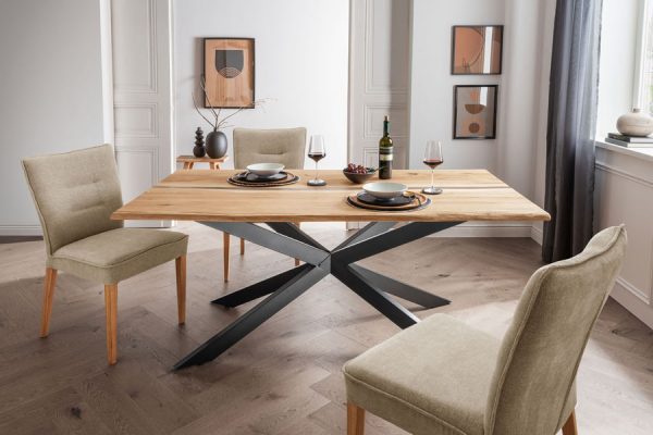 Modern solid wood table with bold X-leg design – dining setup by PLH
