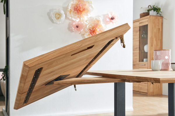 Functional sliding table by PLH with floral decor background