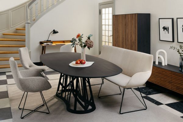 Corner bench and two upholstered chairs with a modern rectangular Rodam dining table – stylish and functional.