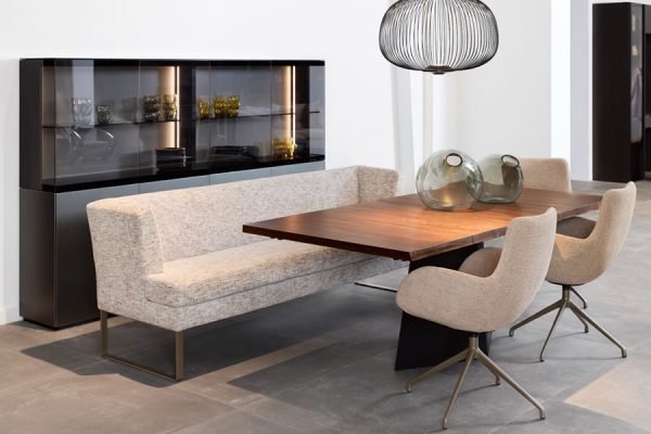 Modern grey sofa with wooden coffee table in living room by Werther